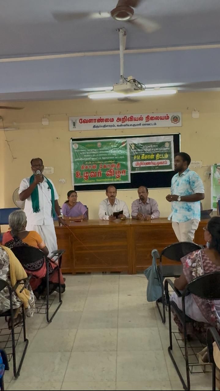 A farmer speaking into a microphone about AgrowNex at the KVK camp